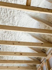 Roof Rafters Covered with Spray Foam
